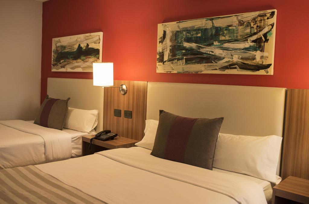 Hotel Bicentenario Suites&Spa San Miguel de Tucumán Habitación foto